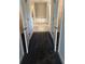 Bright bathroom with large soaking tub visible from bedroom hallway at 3325 Stockton Ave, North Port, FL 34286