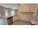 Modern kitchen with stainless steel appliances, bright countertops, and ample cabinet space at 3325 Stockton Ave, North Port, FL 34286