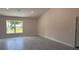 Spacious living room with ample natural light and modern flooring at 3325 Stockton Ave, North Port, FL 34286