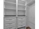 Spacious walk-in closet with ample shelving and drawers at 3420 Wild Oak Bay Blvd # 118, Bradenton, FL 34210