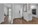 Bright and airy entryway with hardwood floors and access to kitchen and bedroom at 3420 Wild Oak Bay Blvd # 118, Bradenton, FL 34210