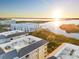 Aerial view of waterfront community at sunset at 392 Aruba Cir # 403, Bradenton, FL 34209