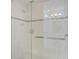 Large walk-in shower with glass enclosure and modern tile at 392 Aruba Cir # 403, Bradenton, FL 34209