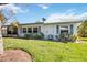 View of the house exterior from the backyard at 4301 Teakwood Cir, Bradenton, FL 34208