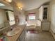 Bathroom boasts a large garden tub, double vanity, and linen closet at 4851 W Gandy Blvd # 5Pa, Tampa, FL 33611