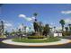 Community entrance with statue and landscaping at 4851 W Gandy Blvd # 5Pa, Tampa, FL 33611