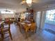 Bright dining room with wooden table and chairs near sliding doors at 4851 W Gandy Blvd # 5Pa, Tampa, FL 33611