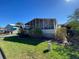 Mobile home features a screened porch and spacious yard at 4851 W Gandy Blvd # 5Pa, Tampa, FL 33611