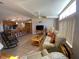 Relaxing living room with ample seating and natural light at 4851 W Gandy Blvd # 5Pa, Tampa, FL 33611