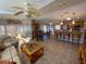 Spacious living room featuring light colored furniture and ceiling fan at 4851 W Gandy Blvd # 5Pa, Tampa, FL 33611