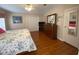 Spacious main bedroom with hardwood floors and large closet at 4851 W Gandy Blvd # 5Pa, Tampa, FL 33611