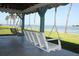 Relaxing waterfront view with porch swings at 4851 W Gandy Blvd # 5Pa, Tampa, FL 33611