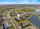 Aerial view showing a house's location near a lake at 4906 Lighthouse Bay Ln, Bradenton, FL 34211