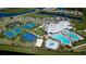 Aerial of community center, tennis courts, pool, and recreational areas at 4906 Lighthouse Bay Ln, Bradenton, FL 34211