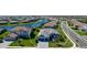 An aerial view shows the home's premium lot and community lake at 4906 Lighthouse Bay Ln, Bradenton, FL 34211