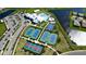 Aerial view of community amenities including pools and tennis courts at 4906 Lighthouse Bay Ln, Bradenton, FL 34211