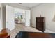 Office boasts wood-look floors, french doors, and furniture at 4906 Lighthouse Bay Ln, Bradenton, FL 34211