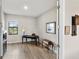 Bright office space with wood floors, desk, and decor for a serene work environment at 4906 Lighthouse Bay Ln, Bradenton, FL 34211