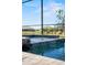 Spa featuring stone tile and waterfall, creating a luxurious and relaxing retreat at 4906 Lighthouse Bay Ln, Bradenton, FL 34211