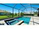 Screened-in pool with a spa and lush landscaping, creating a private oasis at 4906 Lighthouse Bay Ln, Bradenton, FL 34211