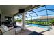 Screened-in pool and patio with a covered seating area, perfect for entertaining and relaxing at 4906 Lighthouse Bay Ln, Bradenton, FL 34211