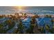 Coastal neighborhood featuring oceanfront homes with palm trees and private beach access at 681 Casey Key Rd, Nokomis, FL 34275