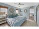 Light blue bedroom with a king-size bed and ocean view at 681 Casey Key Rd, Nokomis, FL 34275