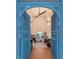 Unique office space with ornate blue doors and a view of the pool at 681 Casey Key Rd, Nokomis, FL 34275