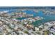 Aerial view showing home's waterfront location and surrounding neighborhood at 8 Island Dr, Treasure Island, FL 33706