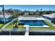 House with a pool and dock on the water at 8 Island Dr, Treasure Island, FL 33706