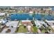 Aerial view showcasing home's location on a canal with surrounding neighborhood at 8 Island Dr, Treasure Island, FL 33706