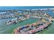 Wide aerial view of the property's location on a canal, close to the beach at 8 Island Dr, Treasure Island, FL 33706