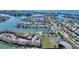 Aerial view showing home's waterfront position in a residential area at 8 Island Dr, Treasure Island, FL 33706
