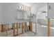Bathroom renovation: New vanity and mirror, exposed plumbing at 8 Island Dr, Treasure Island, FL 33706