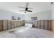Unfinished bedroom with ceiling fan and exposed framing at 8 Island Dr, Treasure Island, FL 33706