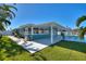 Updated home with a covered patio and pool in backyard at 8 Island Dr, Treasure Island, FL 33706