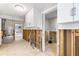 Renovation in progress; kitchen with exposed framing and plumbing at 8 Island Dr, Treasure Island, FL 33706