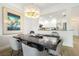 Bright dining area with a view into the kitchen at 862 Hudson Ave # 862, Sarasota, FL 34236