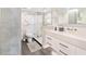 Spa-like bathroom with marble shower, double vanity, and modern fixtures at 888 Boulevard Of The Arts # 1705, Sarasota, FL 34236