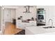 Modern kitchen with stainless steel appliances and marble countertops at 888 Boulevard Of The Arts # 1705, Sarasota, FL 34236