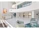 Modern building lobby with reception desk and elevator access at 888 Boulevard Of The Arts # 1705, Sarasota, FL 34236