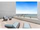 Private patio with seating and bay views at 888 Boulevard Of The Arts # 1705, Sarasota, FL 34236