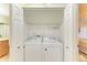 Convenient laundry closet with washer and dryer included at 8911 Manor Loop # 102, Lakewood Ranch, FL 34202