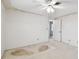 Simple bedroom with ceiling fan and carpeted floors at 916 Mohawk Rd, Venice, FL 34293