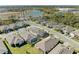 Aerial view of house with pool and solar panels at 11200 Balfour St, Venice, FL 34293