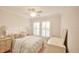 Light and airy bedroom with a queen-size bed and neutral decor at 13109 Palermo Dr, Bradenton, FL 34211