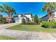 Beautiful home exterior showcasing a well-maintained lawn and landscaping at 13109 Palermo Dr, Bradenton, FL 34211