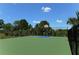 Enjoy the outdoor basketball court with vibrant colors, perfect for recreation and staying active at 1330 Still River Dr, Venice, FL 34293