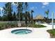 Enjoy the community hot tub surrounded by lush landscaping and a relaxing cabana at 1330 Still River Dr, Venice, FL 34293