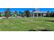 Enjoy a playground and covered picnic area surrounded by green lawns perfect for Gathering gatherings at 1330 Still River Dr, Venice, FL 34293